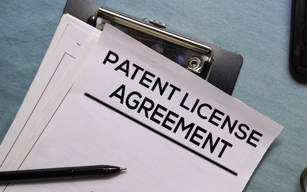 Examining the strategy of building dense webs of patents to create moats that stifle competition and maintain concentrated market power.